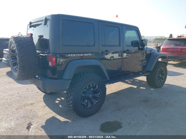 1C4BJWDG0FL581295 Jeep Wrangler Unlimited Sport