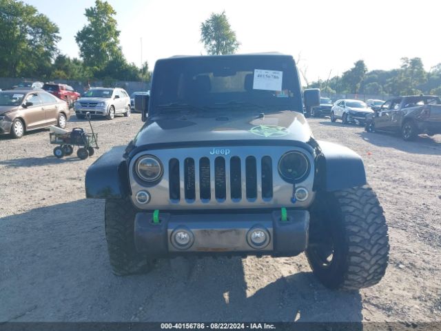 1C4BJWDG2EL235831 Jeep Wrangler Unlimited Freedom Edition