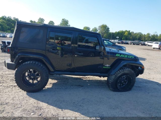 1C4BJWDG2EL235831 Jeep Wrangler Unlimited Freedom Edition
