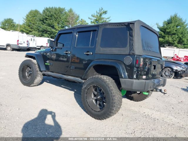 1C4BJWDG2EL235831 Jeep Wrangler Unlimited Freedom Edition