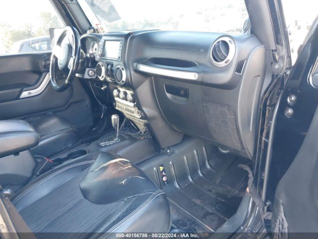 1C4BJWDG2EL235831 Jeep Wrangler Unlimited Freedom Edition