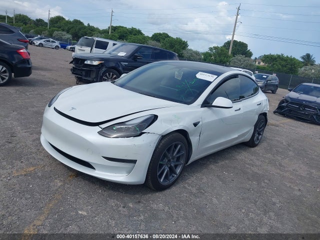 2023 TESLA MODEL 3 5YJ3E1EA3PF590616 Photo 1