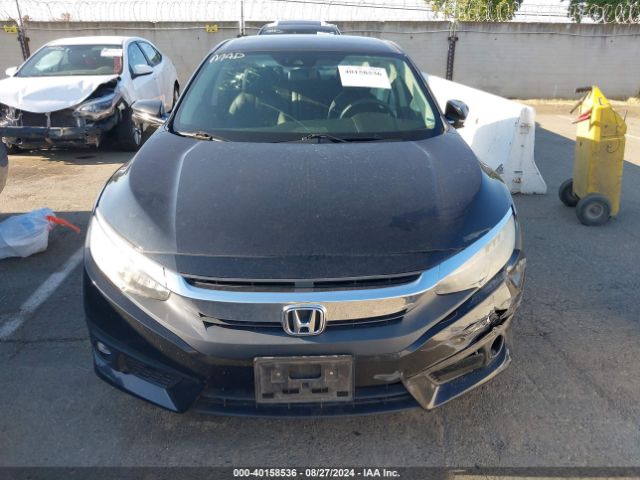 2HGFC1F91GH643526 Honda Civic Touring