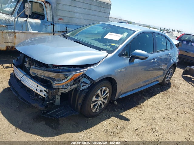 Toyota Corolla Hybrid Le 2021 JTDEAMDE6MJ019426 Image 2