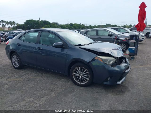 Toyota Corolla Le Plus 2014 2T1BURHEXEC038186 Image 1