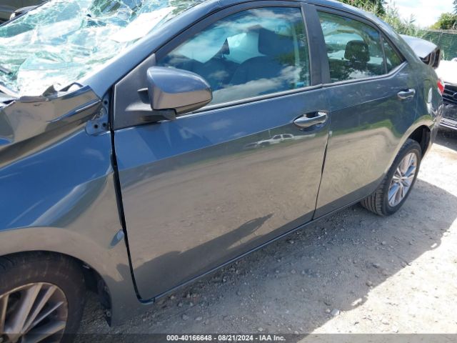 2T1BURHE5EC049919 Toyota Corolla Le Premium