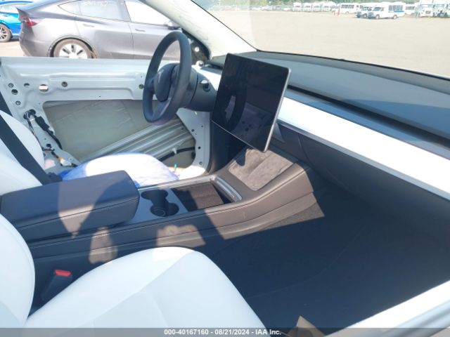 2023 TESLA MODEL Y 7SAYGDEE9PA179807 Photo 4