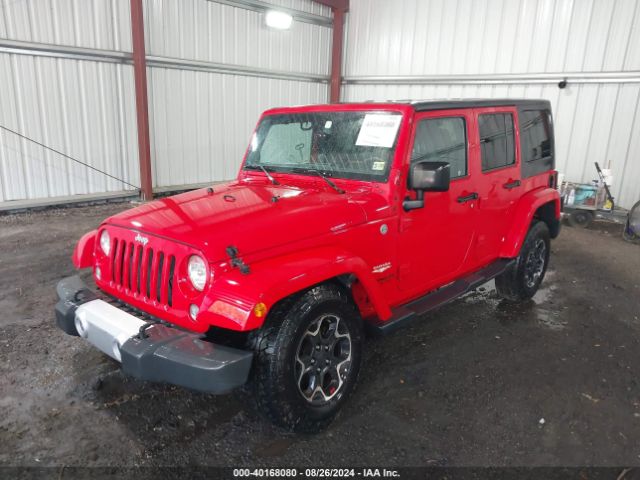 1C4BJWEG2FL642080 Jeep Wrangler Unlimited Sahara