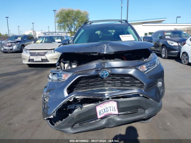 4T3R6RFV9LU004593 Toyota Rav4 Hybrid Xle