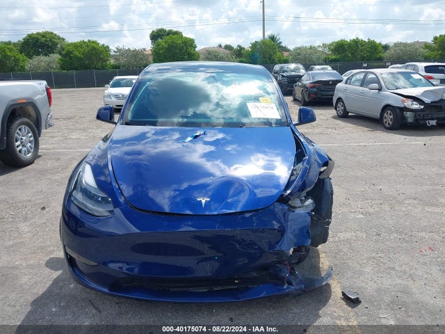 2024 TESLA MODEL Y 7SAYGDEE9RA245369 Photo 5