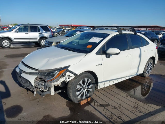 Toyota Corolla Hybrid Le 2021 JTDEAMDE1MJ017678 Image 2