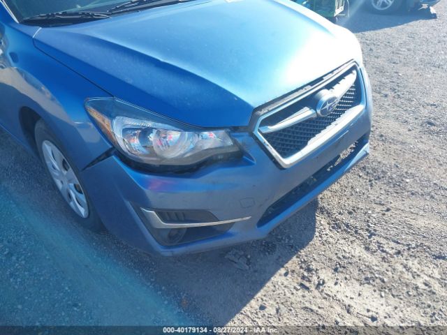 JF1GJAA64FG015952 Subaru Impreza 2.0i