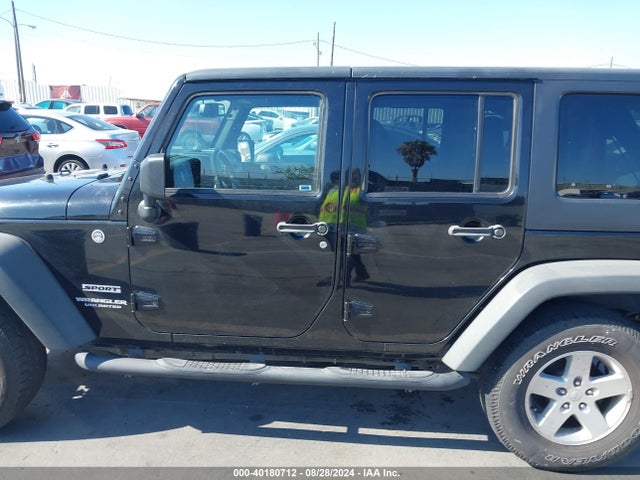 1C4BJWDG0FL666914 Jeep Wrangler Unlimited Sport