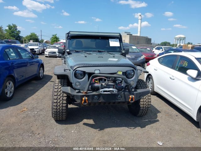 1C4BJWDG8EL129500 Jeep Wrangler Unlimited Sport