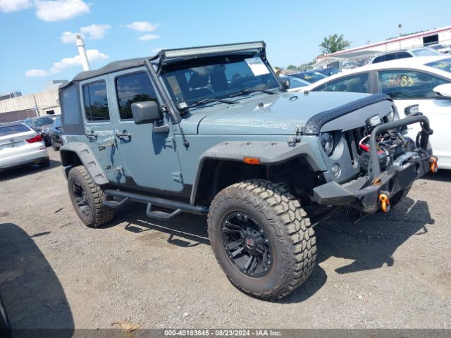 1C4BJWDG8EL129500 Jeep Wrangler Unlimited Sport