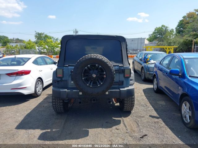 1C4BJWDG8EL129500 Jeep Wrangler Unlimited Sport