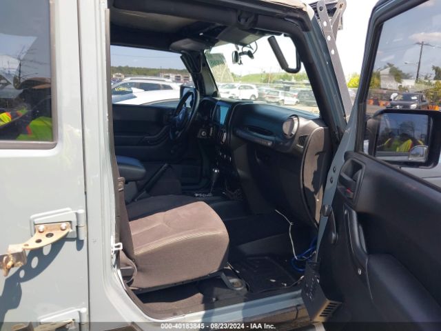 1C4BJWDG8EL129500 Jeep Wrangler Unlimited Sport