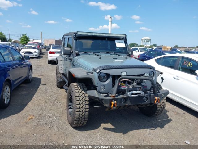 1C4BJWDG8EL129500 Jeep Wrangler Unlimited Sport