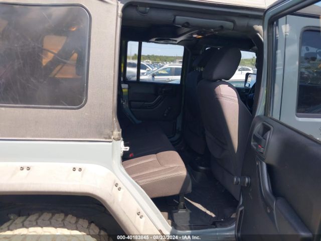 1C4BJWDG8EL129500 Jeep Wrangler Unlimited Sport