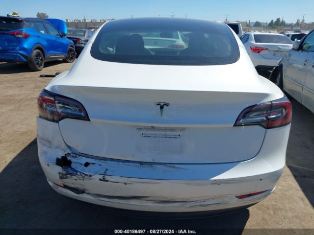 5YJ3E1EA3MF067690 Tesla Model 3 Standard Range Plus Rear-wheel Drive
