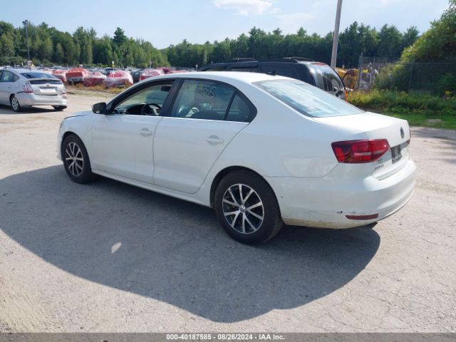 3VWDB7AJ9JM238503 Volkswagen Jetta 1.4t Se/1.4t Wolfsburg Edition