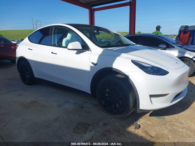 2024 TESLA MODEL Y 7SAYGDED1RF094604 Photo 0