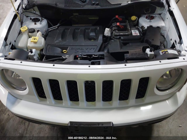 1C4NJPFB4ED825267 Jeep Patriot Latitude