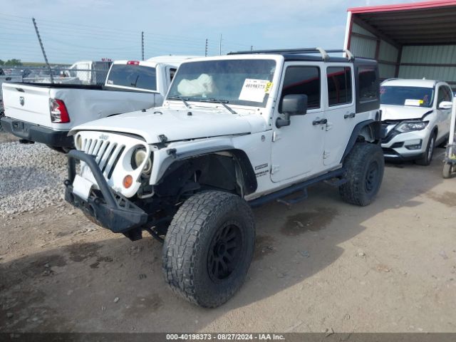 2012 JEEP WRANGLER UNLIMITED 1C4BJWDG0CL188571 Photo 1