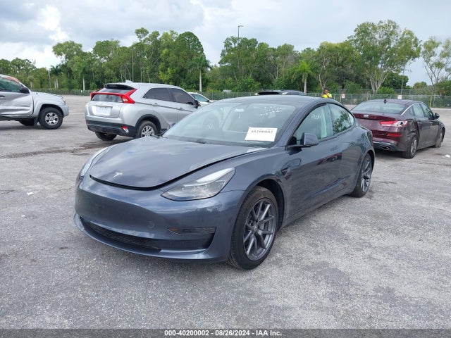 Tesla Model 3 Standard Range Plus Rear-wheel Drive 2021 5YJ3E1EA3MF058374 Image 2
