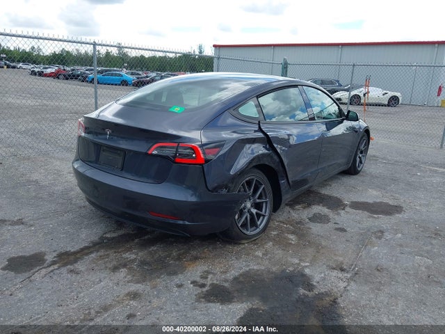 Tesla Model 3 Standard Range Plus Rear-wheel Drive 2021 5YJ3E1EA3MF058374 Image 4