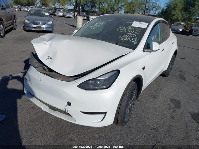 2024 TESLA MODEL Y 7SAYGDED0RF163654 Photo 1