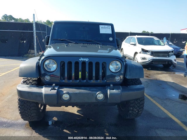 1C4HJWDG0GL184519 Jeep Wrangler Unlimited Sport
