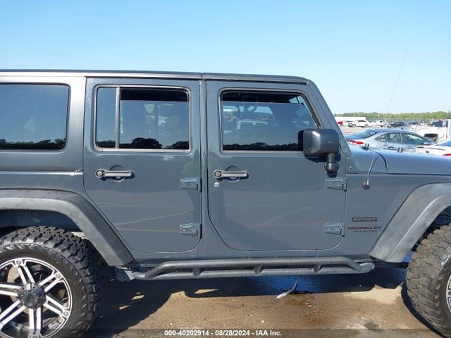 1C4HJWDG0GL184519 Jeep Wrangler Unlimited Sport