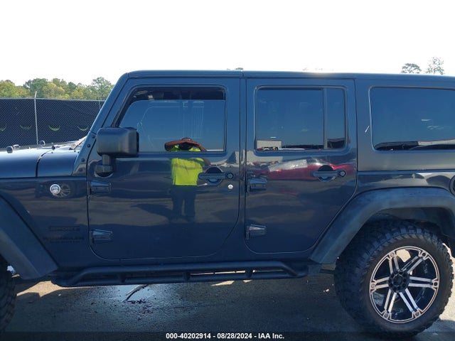 1C4HJWDG0GL184519 Jeep Wrangler Unlimited Sport