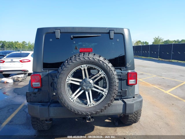 1C4HJWDG0GL184519 Jeep Wrangler Unlimited Sport