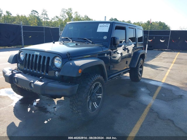 1C4HJWDG0GL184519 Jeep Wrangler Unlimited Sport