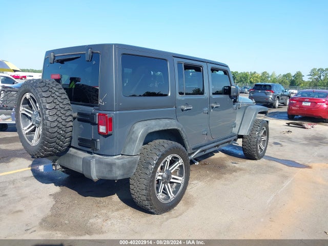 1C4HJWDG0GL184519 Jeep Wrangler Unlimited Sport