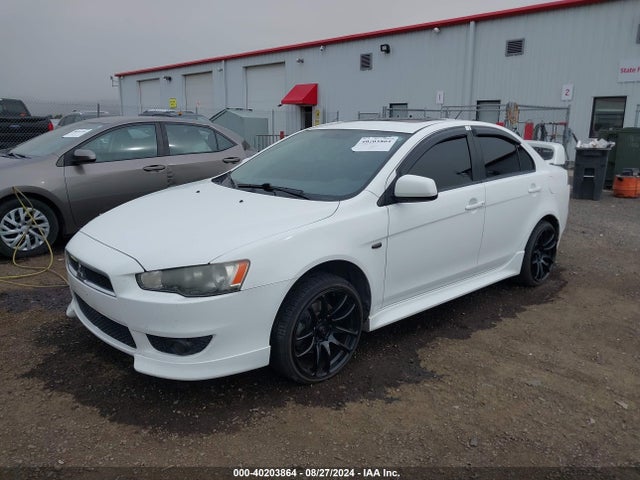 2010 MITSUBISHI LANCER JA32U8FWXAU030767 Photo 1