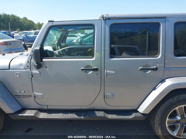 1C4HJWEG9GL162324 Jeep Wrangler Unlimited Sahara