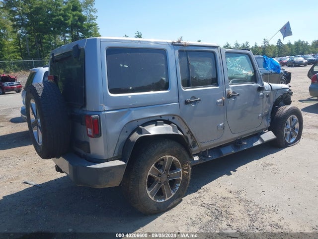 1C4HJWEG9GL162324 Jeep Wrangler Unlimited Sahara