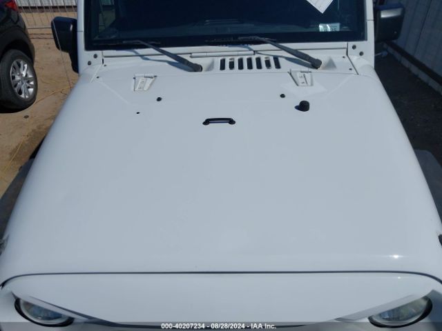 1C4BJWDG9FL589802 Jeep Wrangler Unlimited Sport