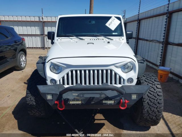 1C4BJWDG9FL589802 Jeep Wrangler Unlimited Sport
