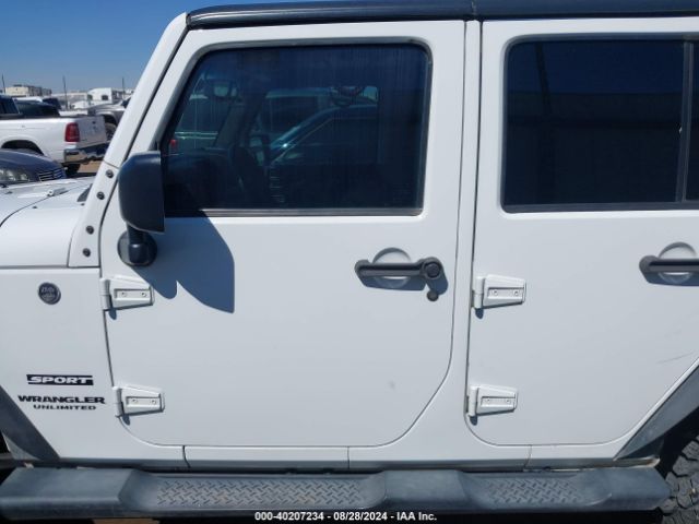 1C4BJWDG9FL589802 Jeep Wrangler Unlimited Sport
