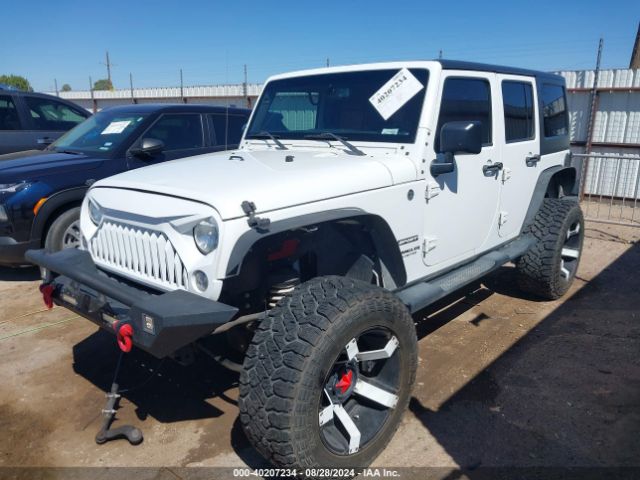 1C4BJWDG9FL589802 Jeep Wrangler Unlimited Sport