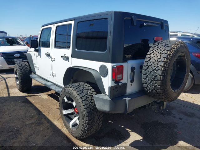 1C4BJWDG9FL589802 Jeep Wrangler Unlimited Sport