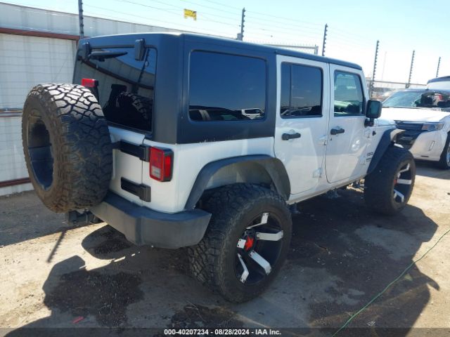 1C4BJWDG9FL589802 Jeep Wrangler Unlimited Sport