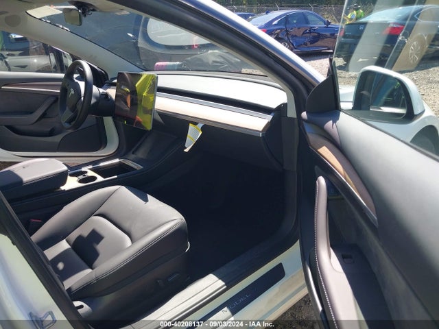 2023 TESLA MODEL 3 5YJ3E1EAXPF561081 Photo 4