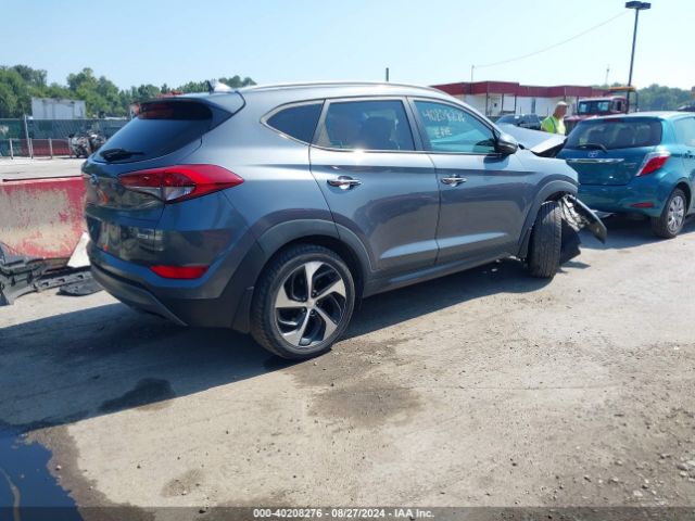 KM8J3CA23GU051990 Hyundai Tucson Limited