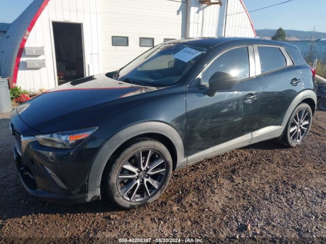 JM1DKFC72J0309204 Mazda Cx-3 Touring