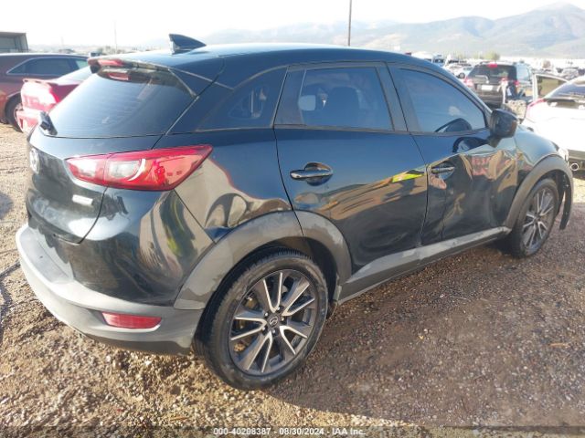 JM1DKFC72J0309204 Mazda Cx-3 Touring